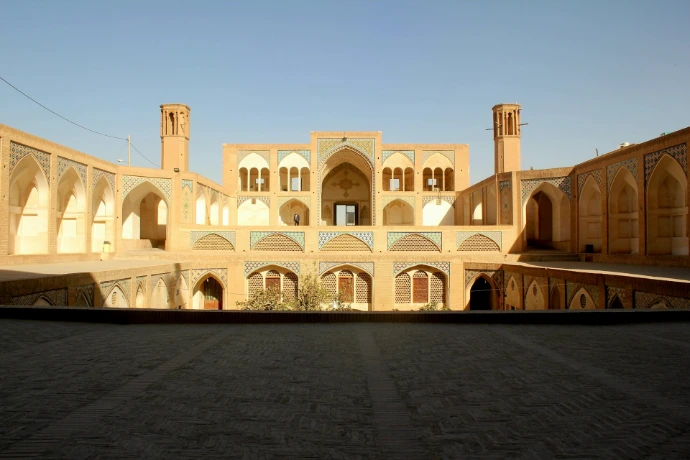 A large building with a lot of windows and arches